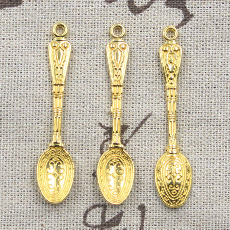15 قطعة ملعقة نمط السحر 48x10  - مراجعة Gold Cutlery Flatware وسعره